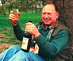 Drinking cider in the orchard